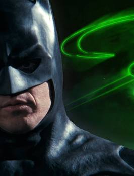 Batman 1989 standing in front of Riddler symbol from Batman Forever