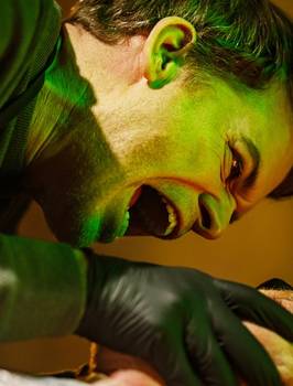 Michael C Hall screaming while he puts his hand over someone's face in Dexter